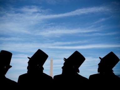 Photos show mock funeral for the penny at Lincoln Memorial