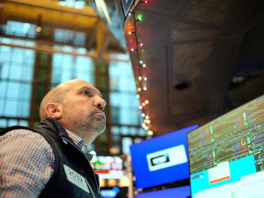 World shares are mixed and Japan’s yen slips after AI stocks push higher on Wall Street