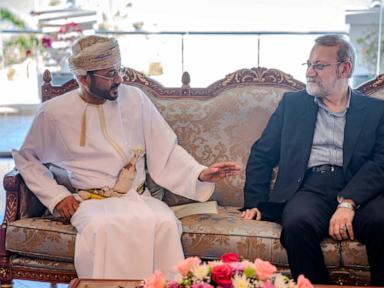 Top Iran security official is in Oman, site of talks with the US, likely with a nuclear message
