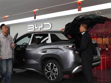 China’s BYD sees 1st profit drop since 2021, but Tesla-rival takes global EV crown